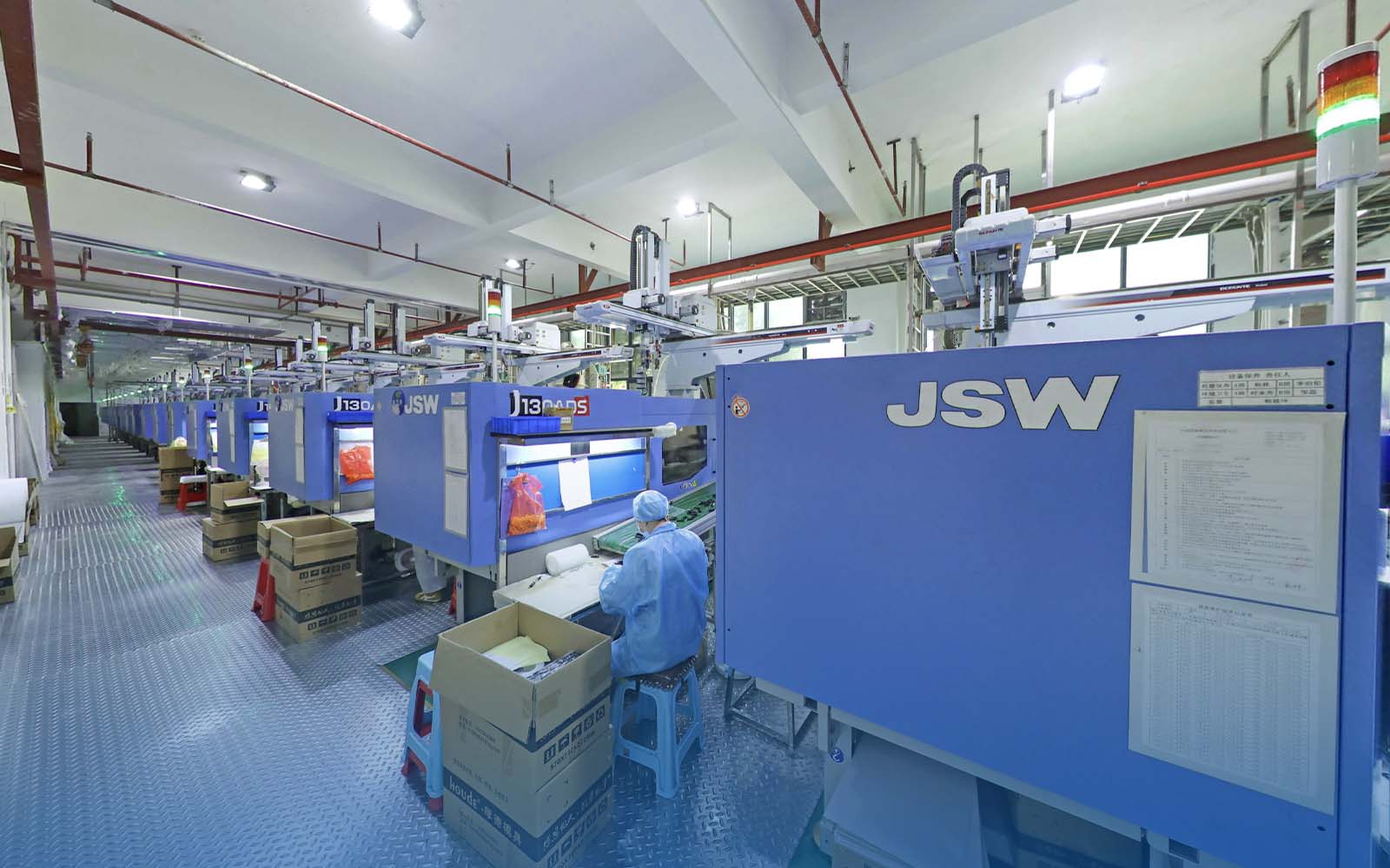 Injection molding workshop with automated JSW machines for OEM plastic parts manufacturing